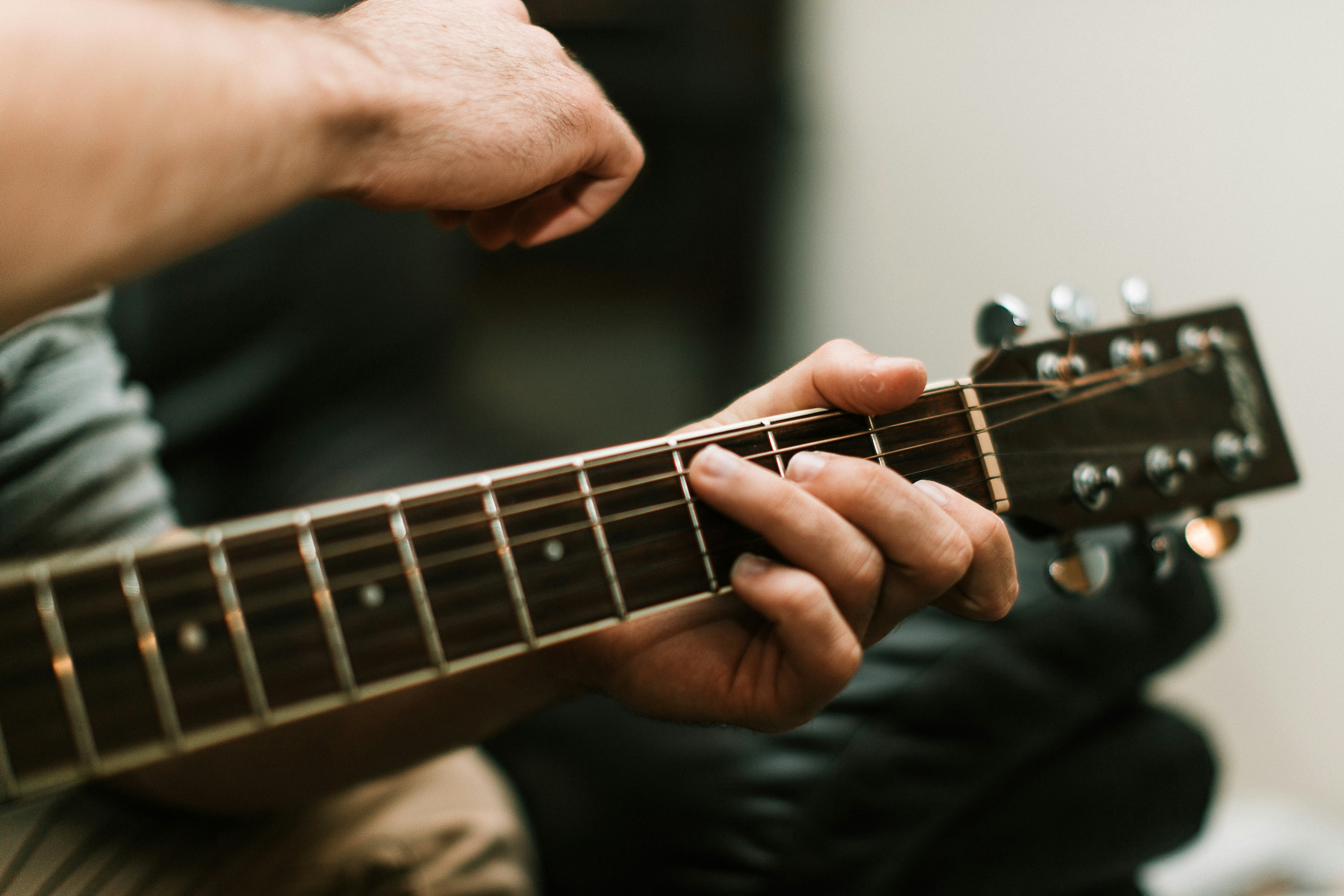 person playing guitar